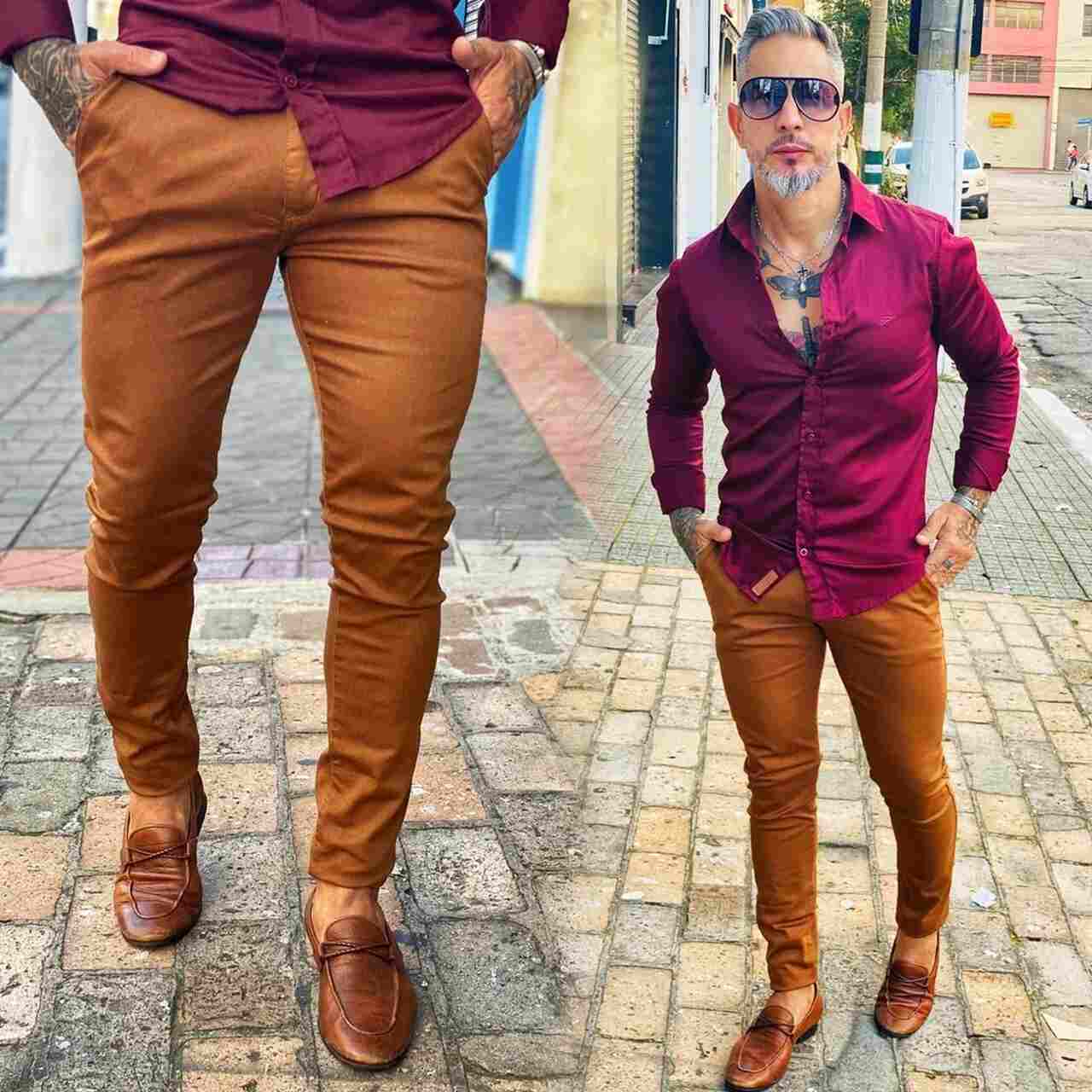 homem com camisa social e calça jeans ajustada